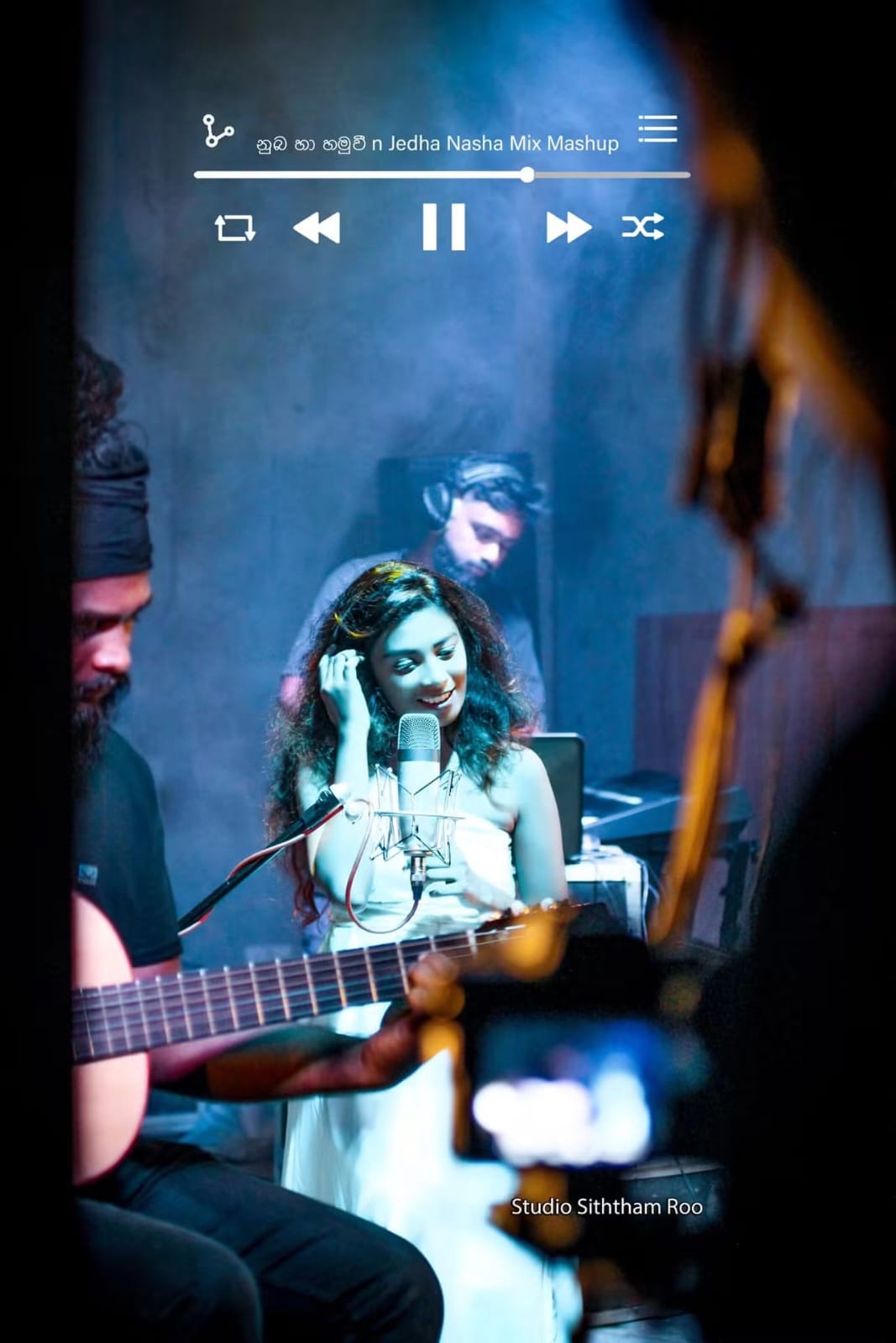 Kawya Erandi recording in the studio